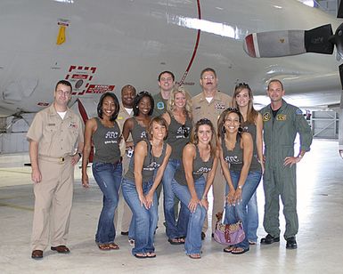U.S. Navy Sailors stationed at Marine Corps Base Hawaii, pose of a group photograph with Cheerleaders for the National Football League (NFL) Atlanta Falcons, Football Team, at Kaneohe, Hawaii, on Oct. 25, 2006. (U.S. Navy photo by Mass Communications SPECIALIST 2nd Class Jennifer L. Bailey) (Released)