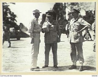 BOUGAINVILLE. 1945-03-26. GENERAL SIR THOMAS A. BLAMEY, COMMANDER-IN-CHIEF, ALLIED LAND FORCES, SOUTH WEST PACIFIC AREA (2), WITH LIEUTENANT-GENERAL S.G. SAVIGE, GENERAL OFFICER COMMANDING 2 CORPS ..