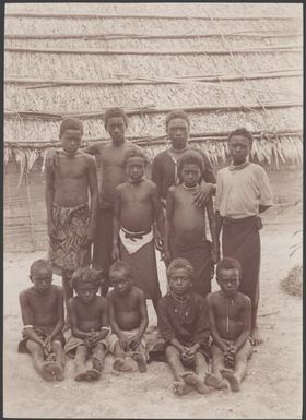 Dr. Welchman with villagers after his return to Mara-na-tabu, Solomon Islands, 1906 / J.W. Beattie