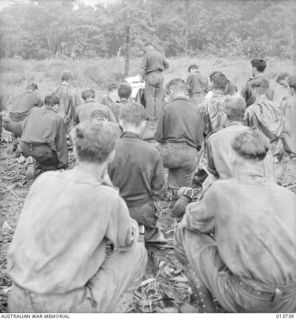 NEW GUINEA. GONA. CHURCH SERVICE BEFORE GOING INTO BATTLE. PADRE J.B. LYNCH. (NEGATIVE BY G. SILK)