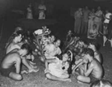 Marquesans at the village of Taiohae perform a dance for the scientists and crew of the Capricorn Expedition