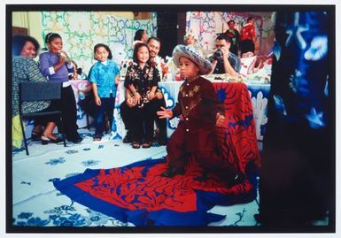 Cook Island haircutting ceremony, Atiu Hall, Mangere, Auckland. Kayne Lucas Upokokeu dances after his haircut