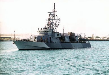 Port bow view of the US Navy (USN) Cyclone Class Coastal Defense Ship, USS MONSOON (PC 4) getting underway while exiting Apra Harbor, Guam after completion of Coordination Afloat Readiness and Training (CARAT) Exercise, while executing the first trans-Pacific cruise of a Patrol Forces boat