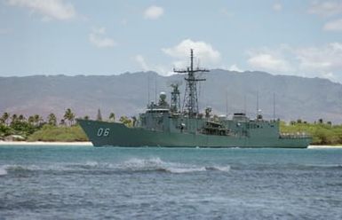 Port bow view of the Australian guided missile frigate HMAS NEWCASTLE (FFG 06) departing Pearl Harbor for Operation RIMPAC 2000