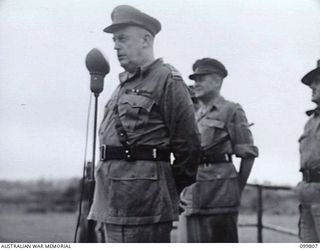 VUNAKANAU, NEW BRITAIN, 1946-02-12. FIRST FULL REGIMENTAL PARADE OF THE PACIFIC ISLANDS REGIMENT AS ONE COMPLETE UNIT. UNTIL THE WAR ENDED COMPANIES AND PLATOONS SERVED IN MANY DIFFERENT AREAS. ..