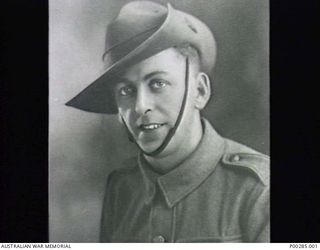 STUDIO PORTRAIT OF CORPORAL PERCY JOSEPH DE FOREST OF 2/23 BATTALION. CORPORAL DEFOREST SERVED IN TOBRUK, LIBYA, AND EL ALAMEIN, EGYPT, AND LATER IN SATTELBERG, NEW GUINEA WHERE HE WAS KILLED IN ..