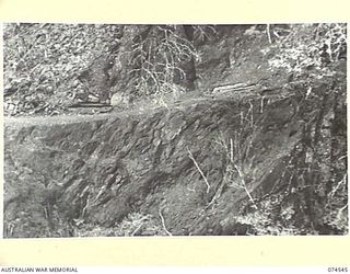 NEW GUINEA. 1944-07-09. A SECTION OF THE WAU-BULLDOG ROAD BETWEEN HERRING GORGE AND STEELE FALLS IN THE COURSE OF CONSTRUCTION