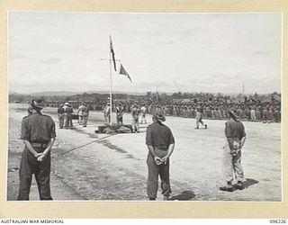 CAPE WOM, NEW GUINEA, 1945-0-13. LIEUTENANT-GENERAL ADACHI, COMMANDER 18 JAPANESE ARMY IN NEW GUINEA, FORMALLY SURRENDERED TO MAJOR-GENERAL H.C.H. ROBERTSON, GENERAL OFFICER COMMANDING 6 DIVISION, ..