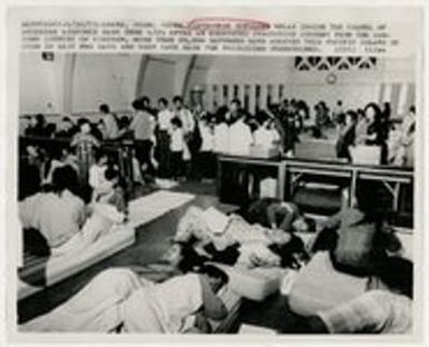 Crowd of refugees in chapel in Guam