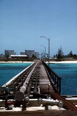 A view of one of the U.S. Navy refueling piers, taken from the salvage ship USS BOLSTER (ARS-38)