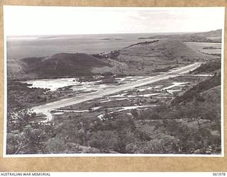 STOKES RANGE, PORT MORESBY AREA, NEW GUINEA. 1943-12-27. LOOKING DOWN ON KILA AERODROME FROM H8 HEAVY ANTI-AIRCRAFT GUN SITE, STOKES RANGE