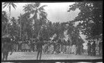 Several people observing some dancing