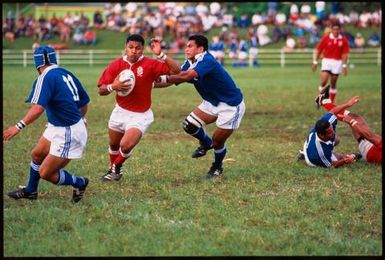 Tongan national rugby league team playing another team,Tonga