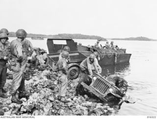 New Britain. December 1943. Landing craft take the American assault troops to the inhospitable shores at Arawe. Although comparatively few casualties were incurred in landing despite enemy ..