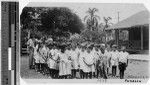 Sister Chanel Xavier, MM, with Maryknoll primary school students, Punahou, Honolulu, Hawaii, 1928