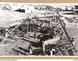SALAMUA, NEW GUINEA. 1943-09-20. BOMB DAMAGED JAPANESE BUILDING DESTROYED DURING ALLIED AIR RAIDS