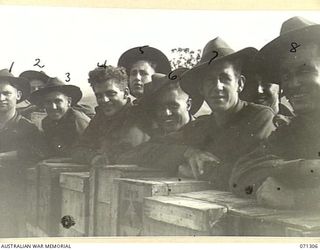 DUMPU, RAMU VALLEY, NEW GUINEA, 1944-03-21. MEMBERS OF THE 2/6TH CAVALRY COMMANDO SQUADRON PICTURED AT DUMPU AIRSTRIP HOMEWARD BOUND. THE UNIT HAS BEEN IN THE VALLEY SINCE THE BATTLE OF KAIAPIT ..