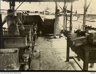 Port Moresby, New Guinea. 1944-05-30. The Brunofix plant at 11 Advanced Workshop, Australian Electrical and Mechanical Engineers (AEME), for blueing the metal parts of small arms to render them ..