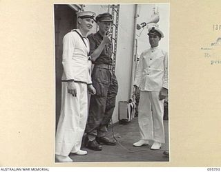 AT SEA OFF RABAUL, NEW BRITAIN. 1945-09-06. THE SURRENDER CEREMONY COVERING THE SURRENDER OF ALL JAPANESE FORCES IN NEW GUINEA, NEW BRITAIN AND THE SOLOMONS TOOK PLACE ON BOARD THE AIRCRAFT CARRIER ..