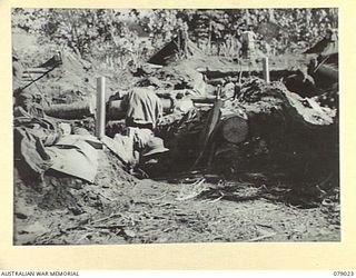 TSIMBA RIDGE, BOUGAINVILLE ISLAND. 1945-02-06. THE 4.2" MORTARS OF THE 101ST BRIGADE SUPPORT COMPANY IN OPERATION DURING THE ATTACK ON ENEMY POSITIONS BY THE 31/51ST INFANTRY BATTALION. IDENTIFIED ..