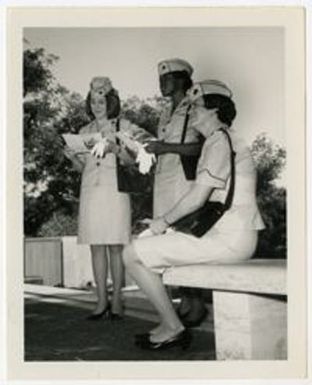 Sue Oliver (on right) and two other Women Marines at the National Memorial Cemetery of the Pacific ("The Punchbowl") in Ohau, Hawaii.
