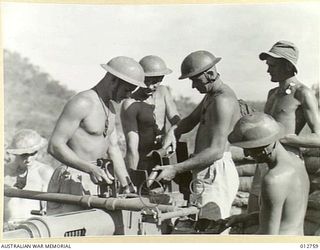 KEEPING THE DEFENCE IN ORDER AT AN ADVANCED OPERATIONAL BASE IN NEW GUINEA. JAPANESE RAIDERS ARE FINDING IT INCREASINGLY DIFFICULT TO OPERATE EFFECTIVELY AGAINST OUR FORWARD BASES OWING TO THE ..