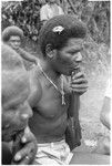 Men playing 'auilangi panpipes, kwa'ikwa'i style, impromptu concert, 8 players