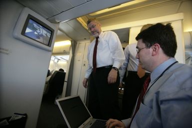 David Addington Talks With Derrick Morgan Aboard Air Force Two En Route to Guam