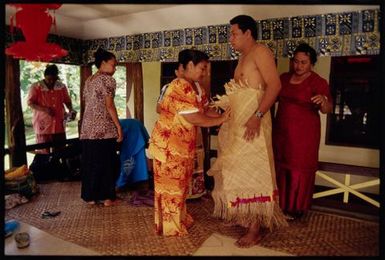 Conferring of Matai Ariki titles, Sāmoa. The new matai, Matautia Ieriko Niulevaea, is dressed for the occasion