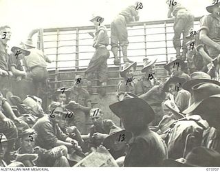 AT SEA, NEW GUINEA. 1944-05-31. TROOPS OF THE 37/52ND INFANTRY BATTALION RESTING ON AN AMERICAN LANDING BARGE ON THE JOURNEY TO THE FORWARD BASE OF SARANG HARBOUR FROM NAGADA DURING PREPARATIONS ..