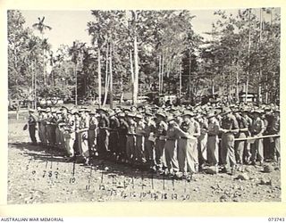 LAE, NEW GUINEA. 1944-06-07. THE CONGREGATION DURING A SPECIAL SERVICE HELD FOR THE INVASION OF FRANCE AT THE NEW GUINEA FORCE CINEMA, HEADQUARTERS NEW GUINEA FORCE. IDENTIFIED PERSONNEL ARE:- ..