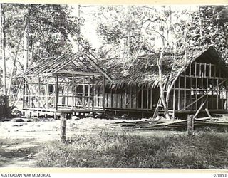 LAE, NEW GUINEA. 1945-01-18. THE PHOTOGRAPHIC LABORATORY OF THE 2ND MILITARY HISTORY FIELD TEAM ATTACHED TO HEADQUARTERS, FIRST AUSTRALIAN ARMY IN THE COURSE OF CONSTRUCTION ON THE BUTIBUM ROAD. ..
