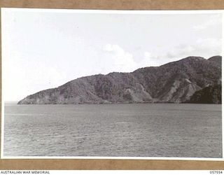 SALAMUA, NEW GUINEA. 1943-09-19. HARBOUR COASTLINE. TO JOIN PHOTOGRAPHS 57555 AND 57556
