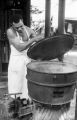 Malaysia, Republic of Fiji Military Forces soldier cooking at camp