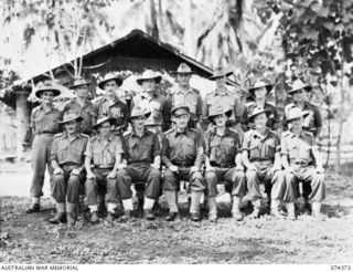 SIAR, NEW GUINEA. 1944-06-27. OFFICERS OF HEADQUARTERS, 15TH INFANTRY BRIGADE. IDENTIFIED PERSONNEL ARE:- VX112187 CAPTAIN L.J. BRENCHLEY (1); VX124327 CAPTAIN J.R. CLEARY (2); VX104157 CAPTAIN ..