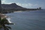 During a break from the Swan Song Expedition (1961) a member of the crew took this photo of Waikiki beach from their hotel room; Diamond Head can be seen in background. September 1961