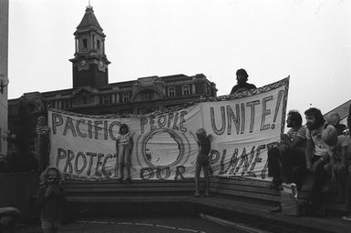 Anti-Nuclear march 'Banner Pacific People Unite Protect Our Planet' in front of Central Post Office, Lower Queen Street