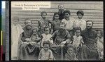 Missionary fathers with indigenous Christian children, Papua New Guinea, ca.1900-1930