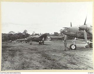 1943-05-19. NEW GUINEA. ON AN AIRSTRIP SOMEWHERE IN NEW GUINEA. (NEGATIVE BY N. BROWN)