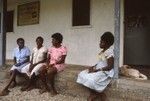 Women chatting with a nurse outside the Women's Ward of the Boyd Memorial Clinic