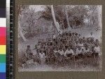 Group portrait of school class outdoors, Delena, Papua New Guinea, ca. 1905-1915