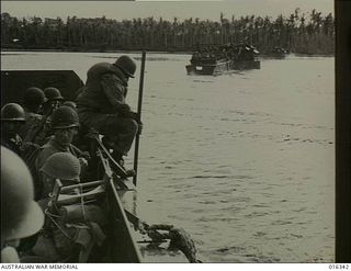 New Britain. 15 December 1943. Landing craft approach the inhospitable shores near Arawe, where American troops forced a landing at drawn in one of the most daring amphibious assaults yet ..