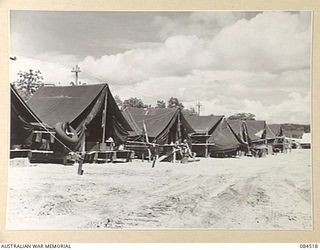 LABU, NEW GUINEA. 1944-12-18. THE OTHER RANKS' LINES AT 55 PORT CRAFT COMPANY, THESE TENTS ARE SITUATED WITHIN 20 YARDS OF THE WATER