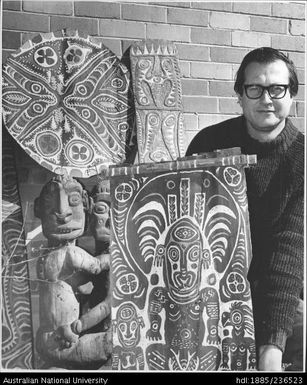 Dr Donald Laycock with paintings to be shown as part of the Sepik art exhibition