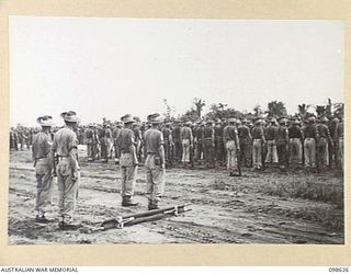 WEWAK, NEW GUINEA. 1945-10-26. A CEREMONIAL PARADE AND MARCH PAST BY 6 DIVISION WAS INSPECTED BY GENERAL SIR THOMAS A. BLAMEY, COMMANDER-IN-CHIEF, ALLIED LAND FORCES, SOUTH WEST PACIFIC AREA, AT ..