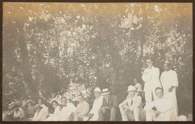 Group sitting beneath trees. From the album: Samoa