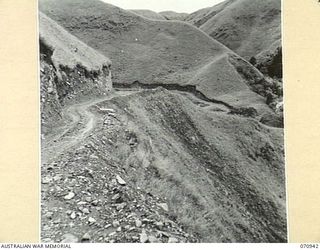 ZENAG, NEW GUINEA, 1944-02-27. THE FOURTY ONE AND THREE QUARTER MILE POINT FROM WAU SHOWING THE START OF THE "ZENAG JUMP UP" FROM THE CREEK BED IN THE BOTTOM RIGHT HAND CORNER OF THE PICTURE. THIS ..