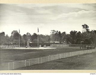 FINSCHHAFEN NEW GUINEA, 1944-02-29. A GENERAL VIEW OF THE OFFICIAL OPENING OF THE FINSCHHAFEN WAR CEMETERY BY VX20308 MAJOR-GENERAL F.H. BERRYMAN, CBE, DSO, OFFICER COMMANDING 2ND AUSTRALIAN CORPS, ..