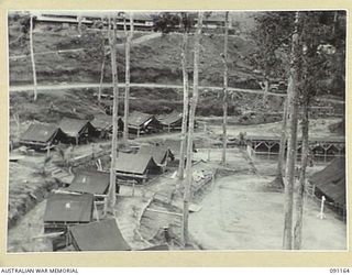 TOROKINA, BOUGAINVILLE. 1945-04-19. THE PARADE GROUND AT 2/3 CONVALESCENT DEPOT WHICH IS ALSO USED BY PATIENTS FOR PHYSICAL TRAINING AND SPORT