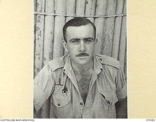 MILNE BAY, NEW GUINEA. 1944-02-12. QX998 LANCE-CORPORAL R. WALDECK, DETACHMENT Z FIELD SECURITY SECTION ATTACHED TO THE MILNE BAY BASE SUB AREA